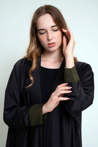 Detailed view of Bahrini Style Black Abaya With Green Cuff Sleeve
