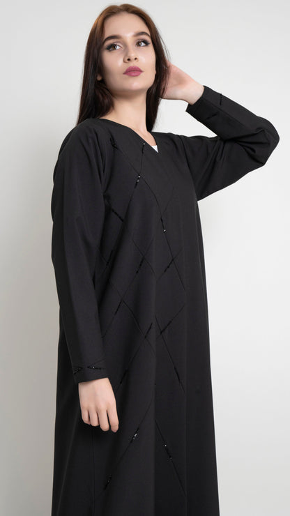 Abaya in Dubai online with geometric pintucks and embellished with bead detailing
