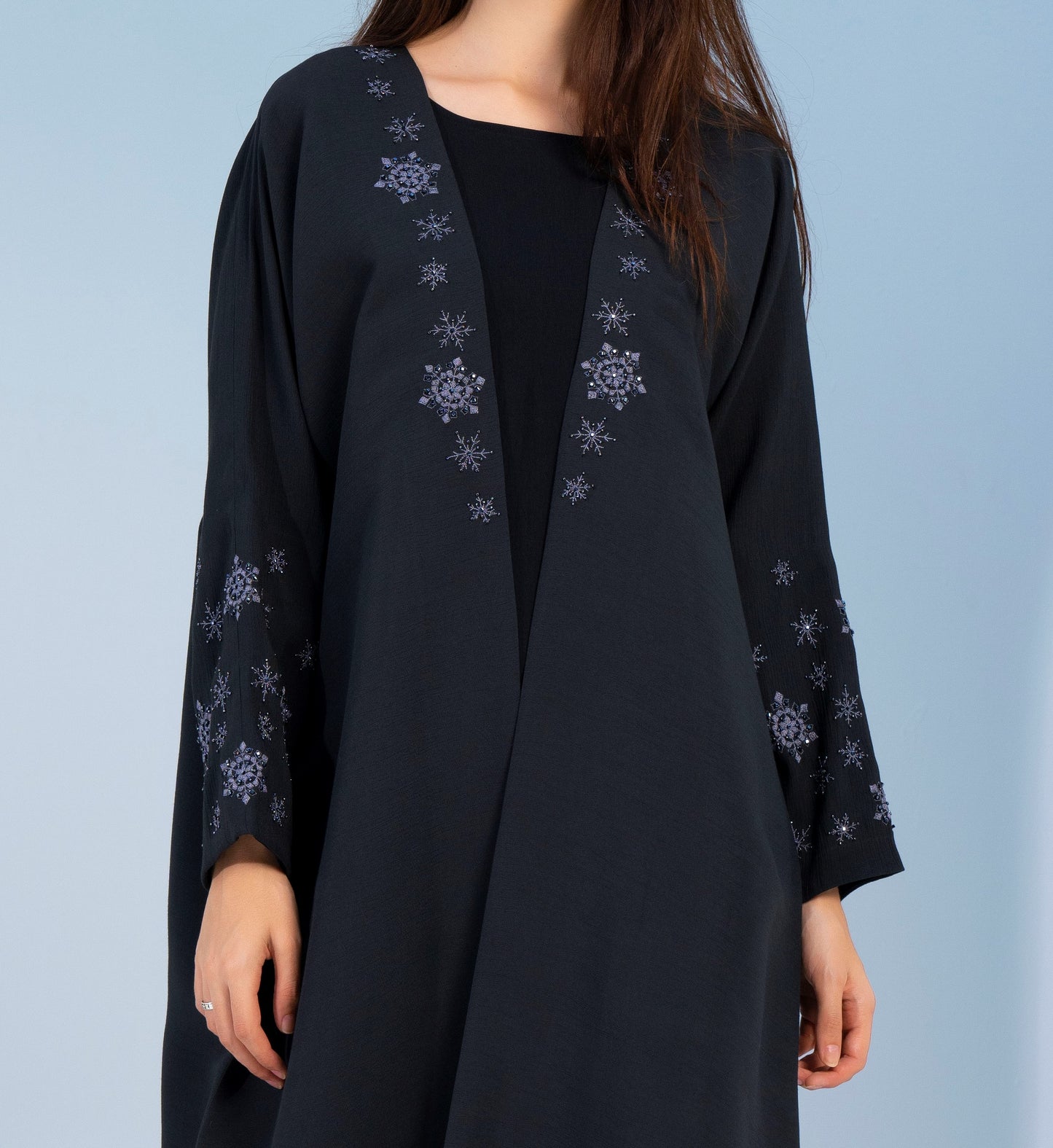 Black bisht abaya with snowflake embroidery and embellishments in Dubai