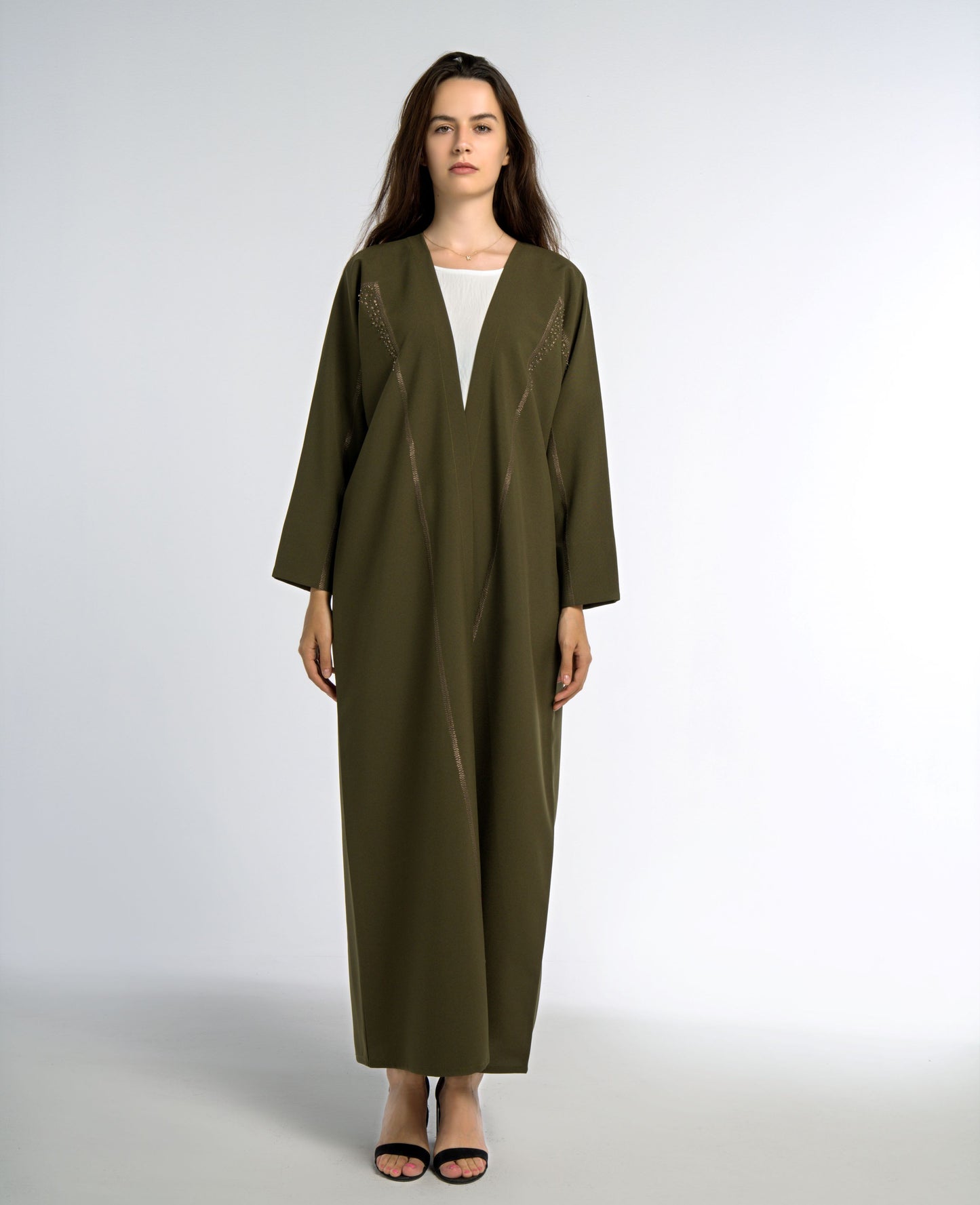 Girl wearing green colored bisht abaya