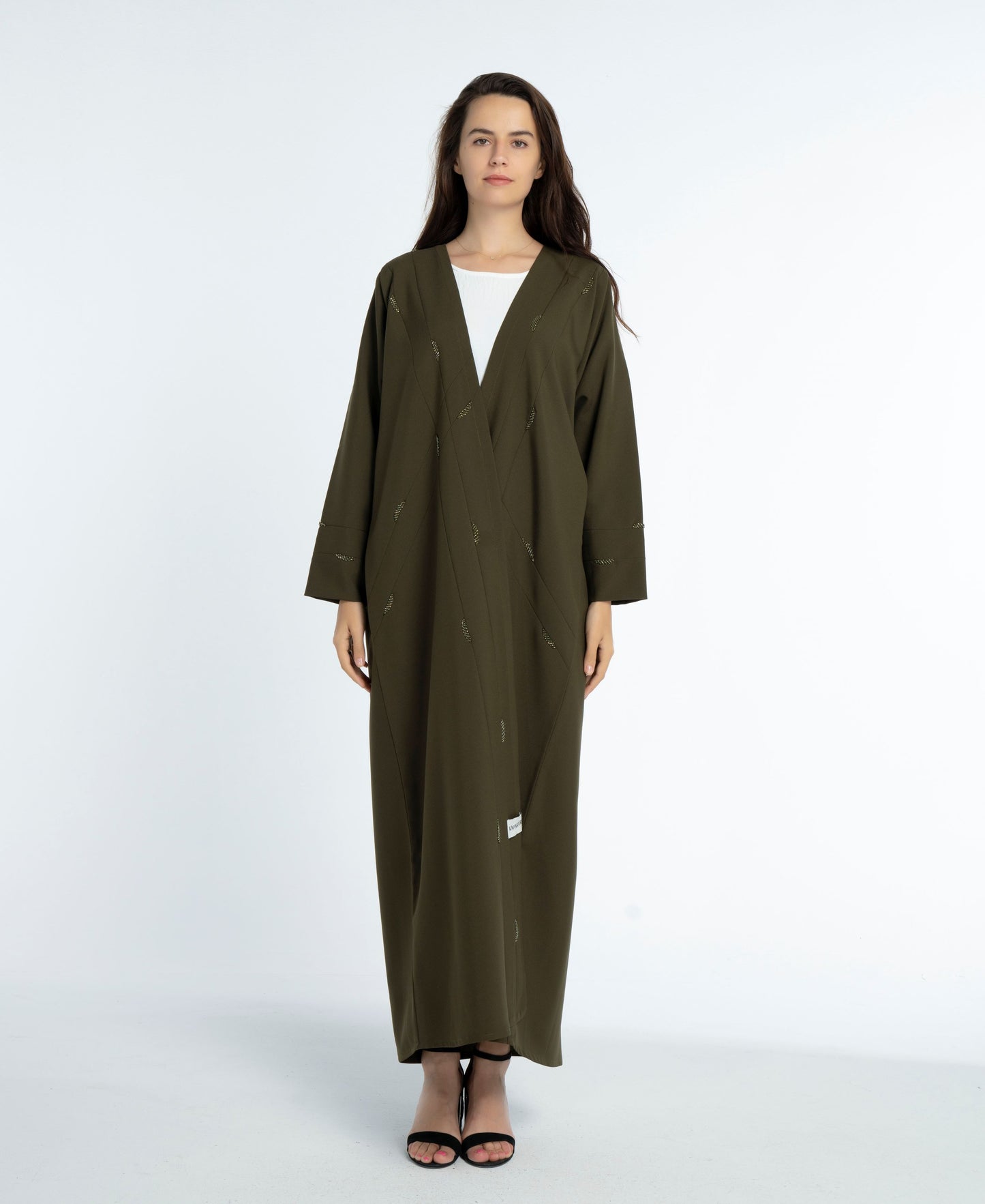 Green colored bisht abaya with elegant line-patterned worm bead embellishments