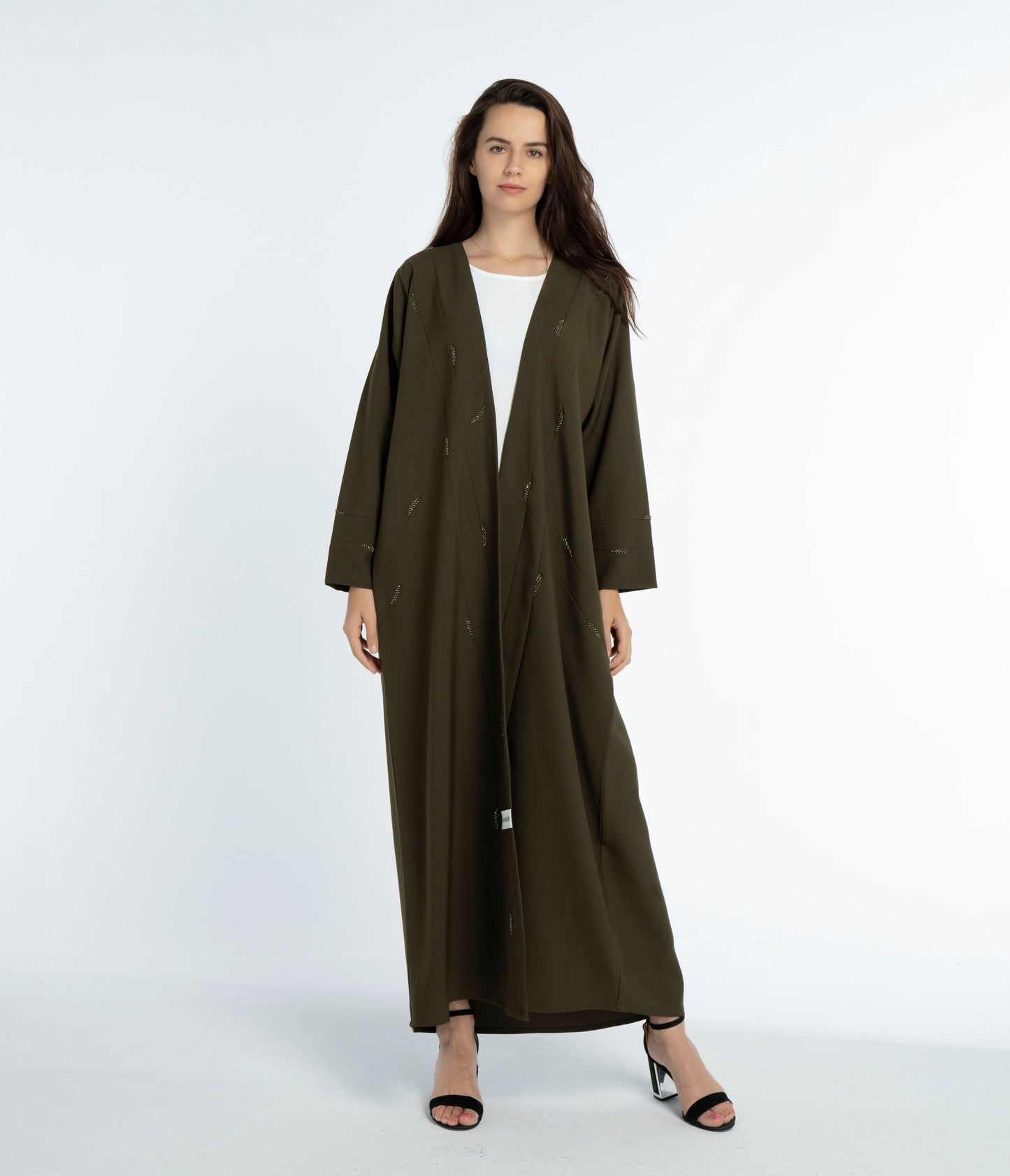 Green abaya with line-patterned worm bead embellishments