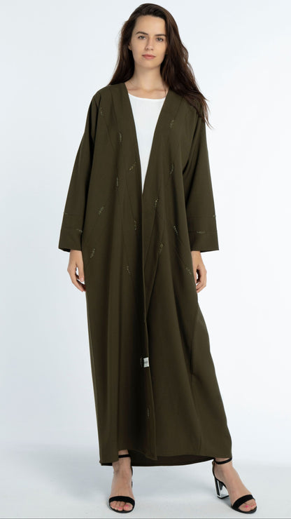Green abaya with line-patterned worm bead embellishments