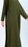detailed view of abaya with embellishments on side and sleeves