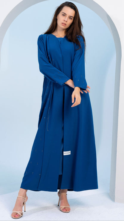 Sky blue V-neck abaya with embellishments on side and both sleeves.