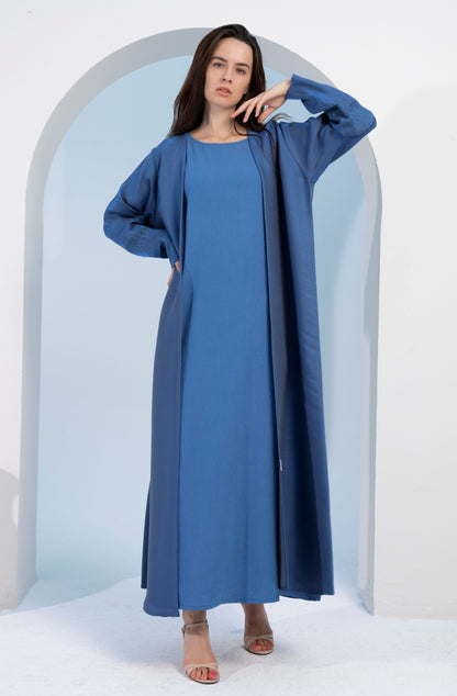 Sky blue colored bisht abaya with sparkling embellishments.