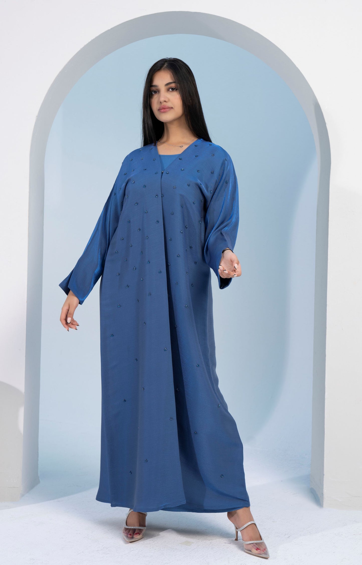 Sky blue bisht abaya with delicate embellishments throughout