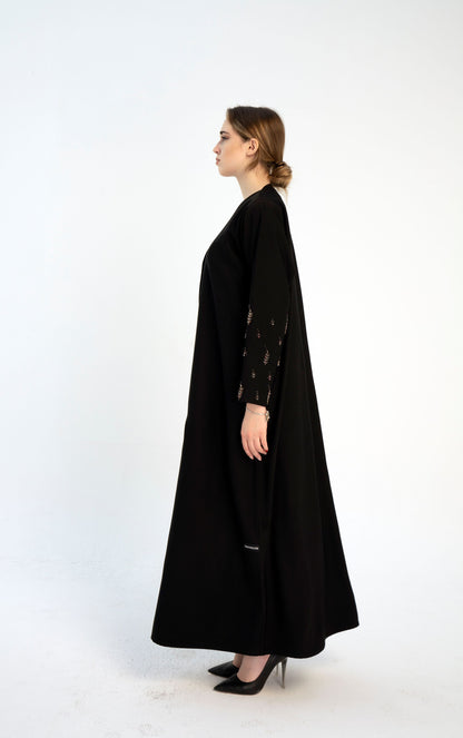 Black abaya with Stylized Curve Cut Pattern With Floral Bead Embellishments On the Front flaps And Sleeves