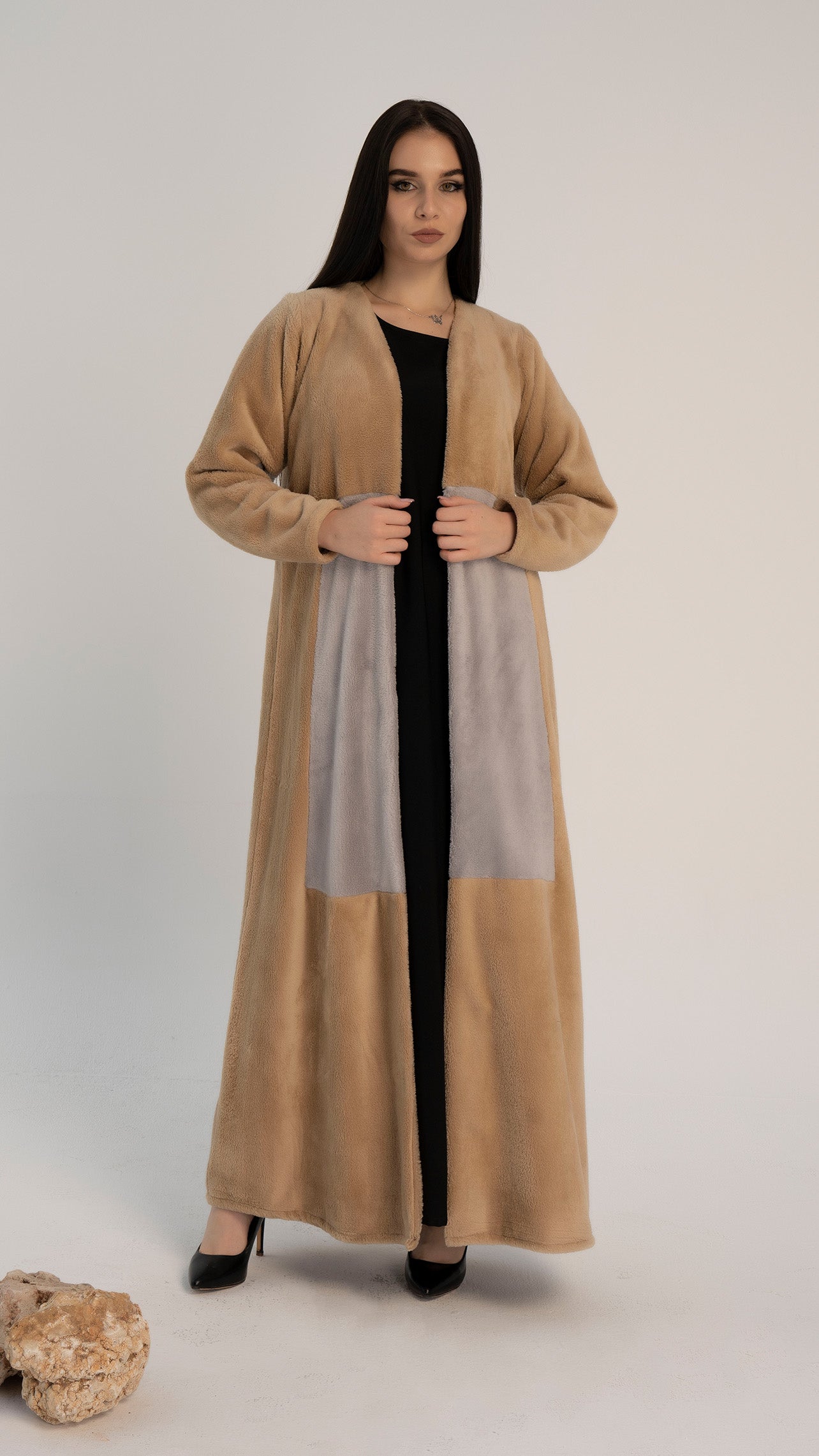 Woolen abaya with soft texture with color block pattern on front.